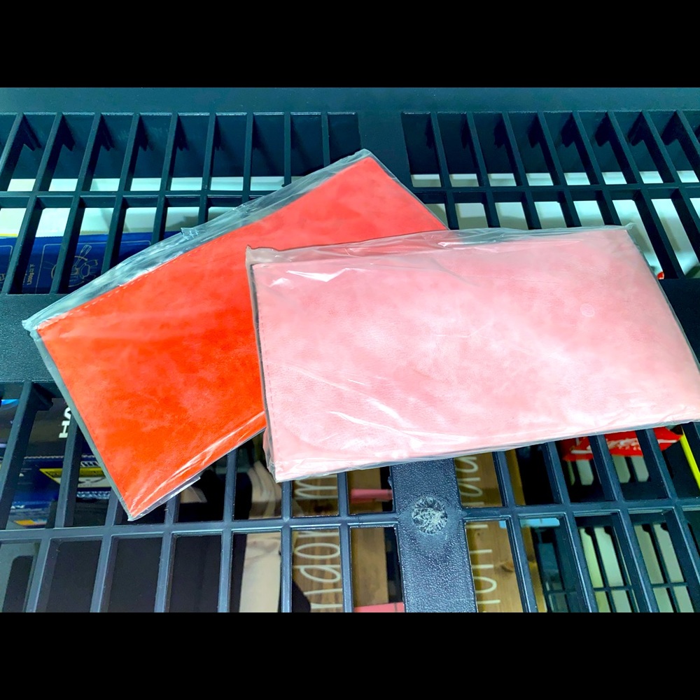 2 clutch/ wallets